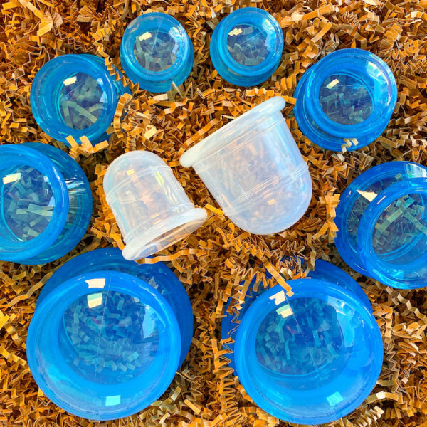 blue and clear silicone cups on brown crinkle paper